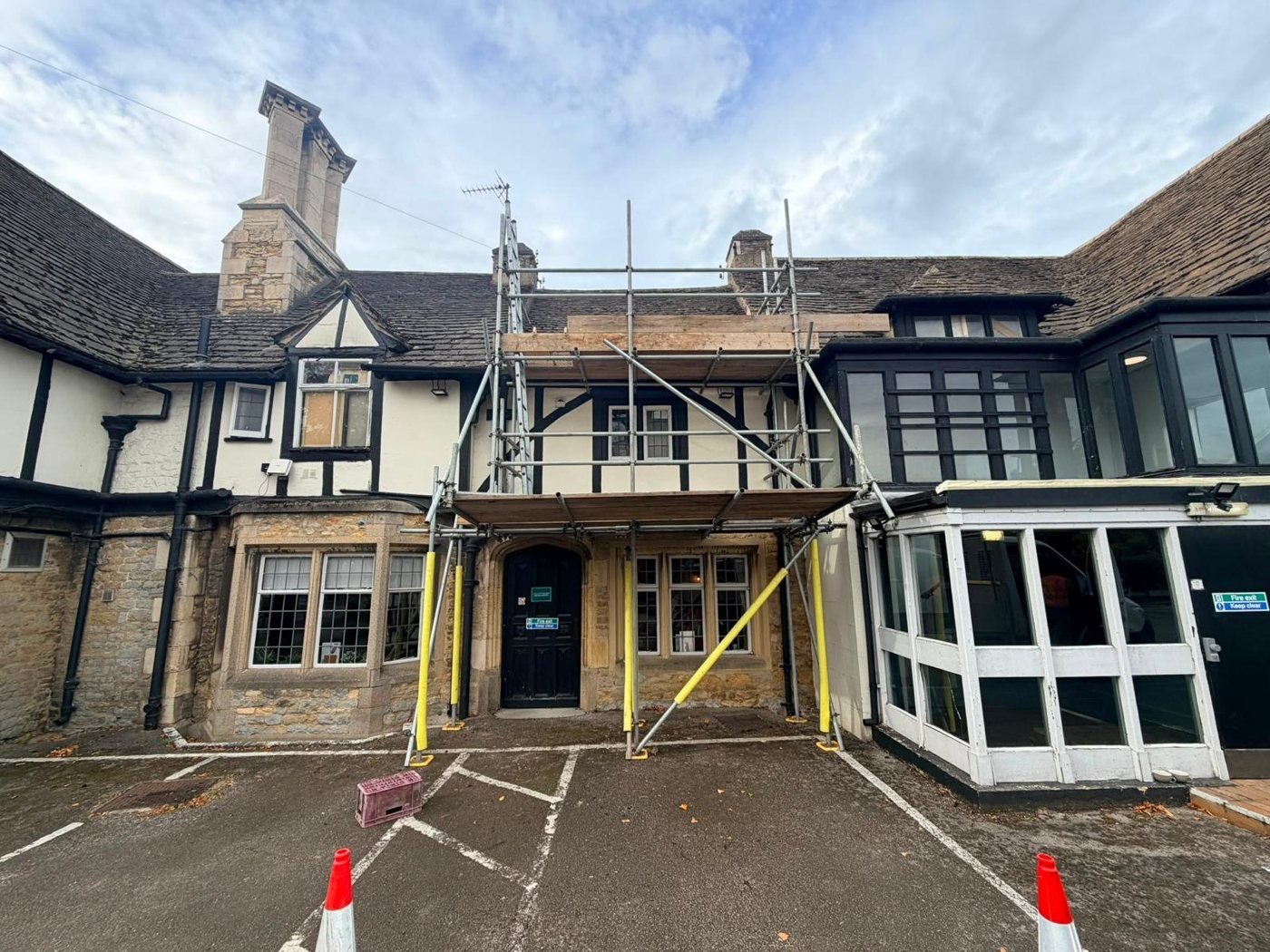 Scaffolding: timber-framed building entrance
