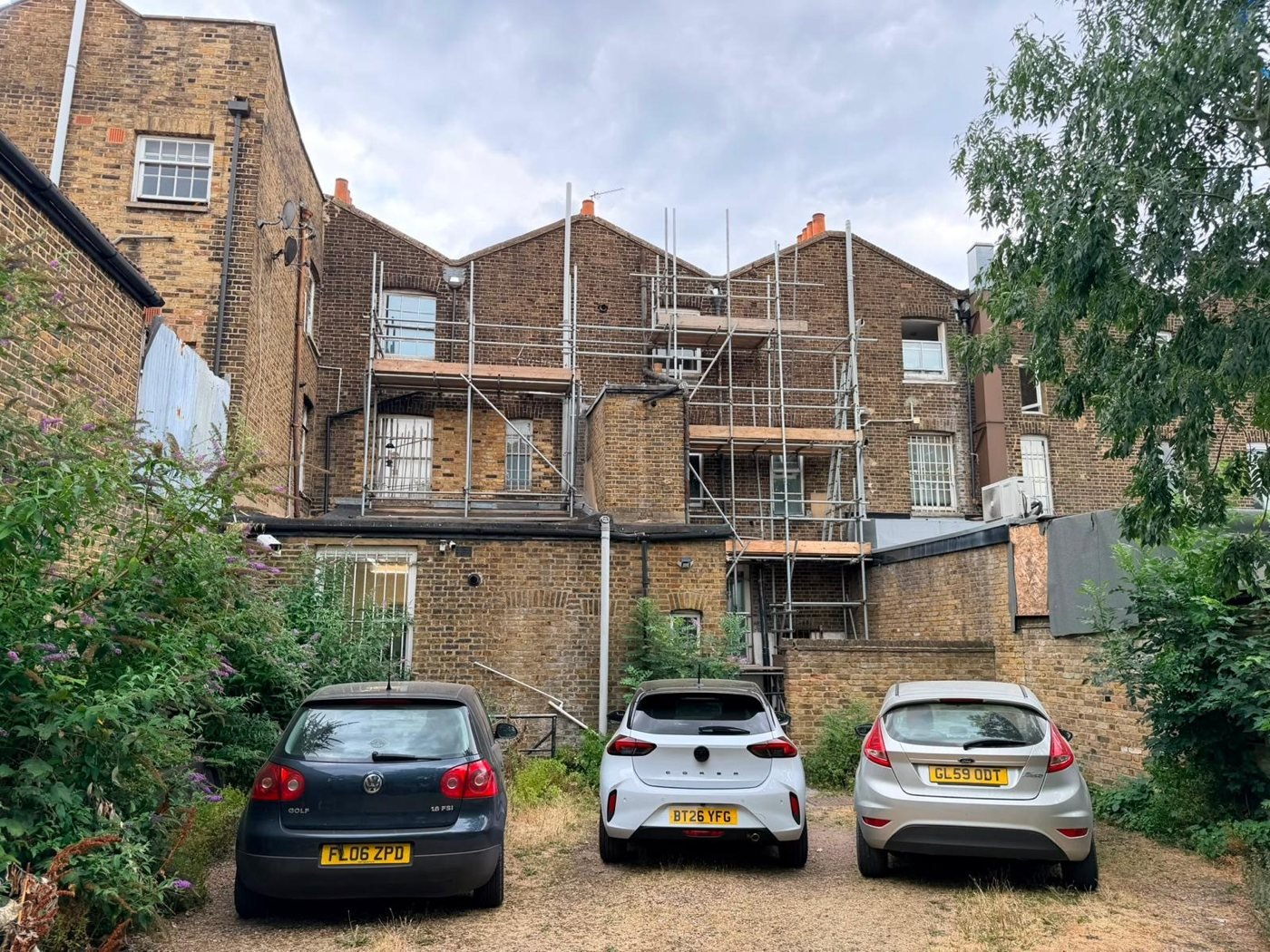 Scaffolding: brick building rear elevation